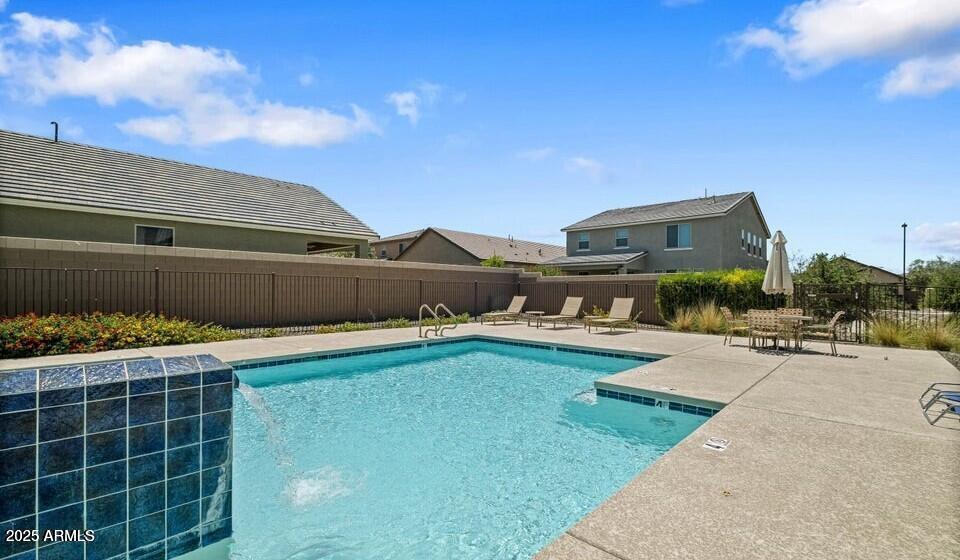7925 South 24th Way Phoenix, AZ 85042 - Photo 19 of 19 a front view of a house with garden
