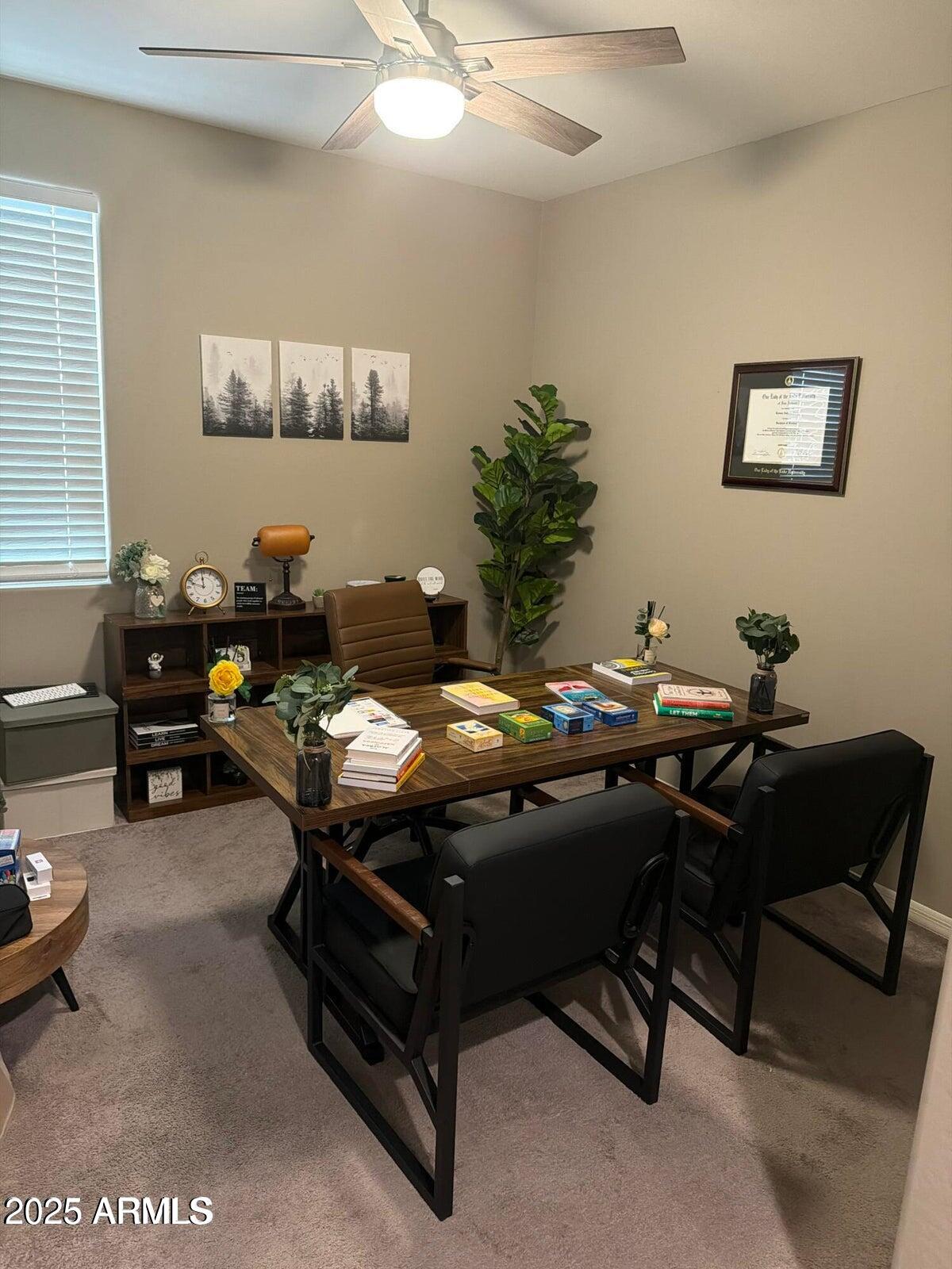 7925 South 24th Way Phoenix, AZ 85042 - Photo 3 of 19 a living room with furniture a rug and a window