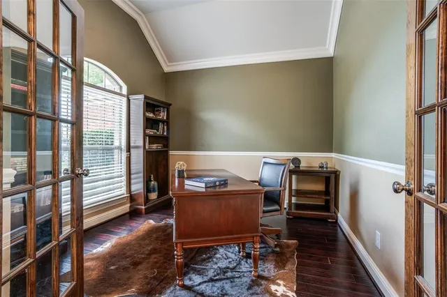 a workspace with furniture and wooden floor