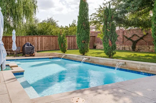 swimming pool with outdoor seating
