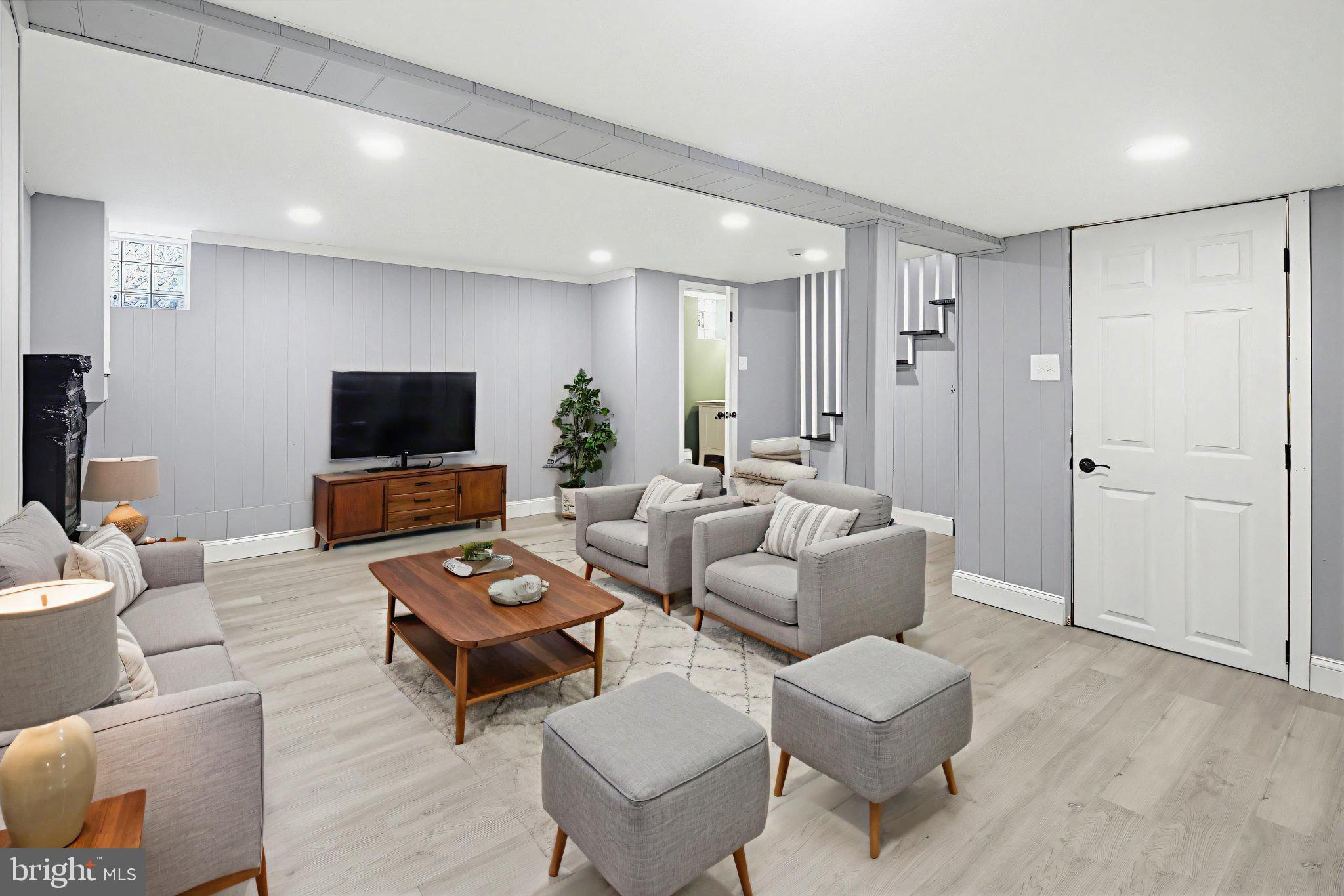 12 North Rosedale Street Baltimore, MD 21229 - Photo 19 of 25 Modern, inviting basement retreat.