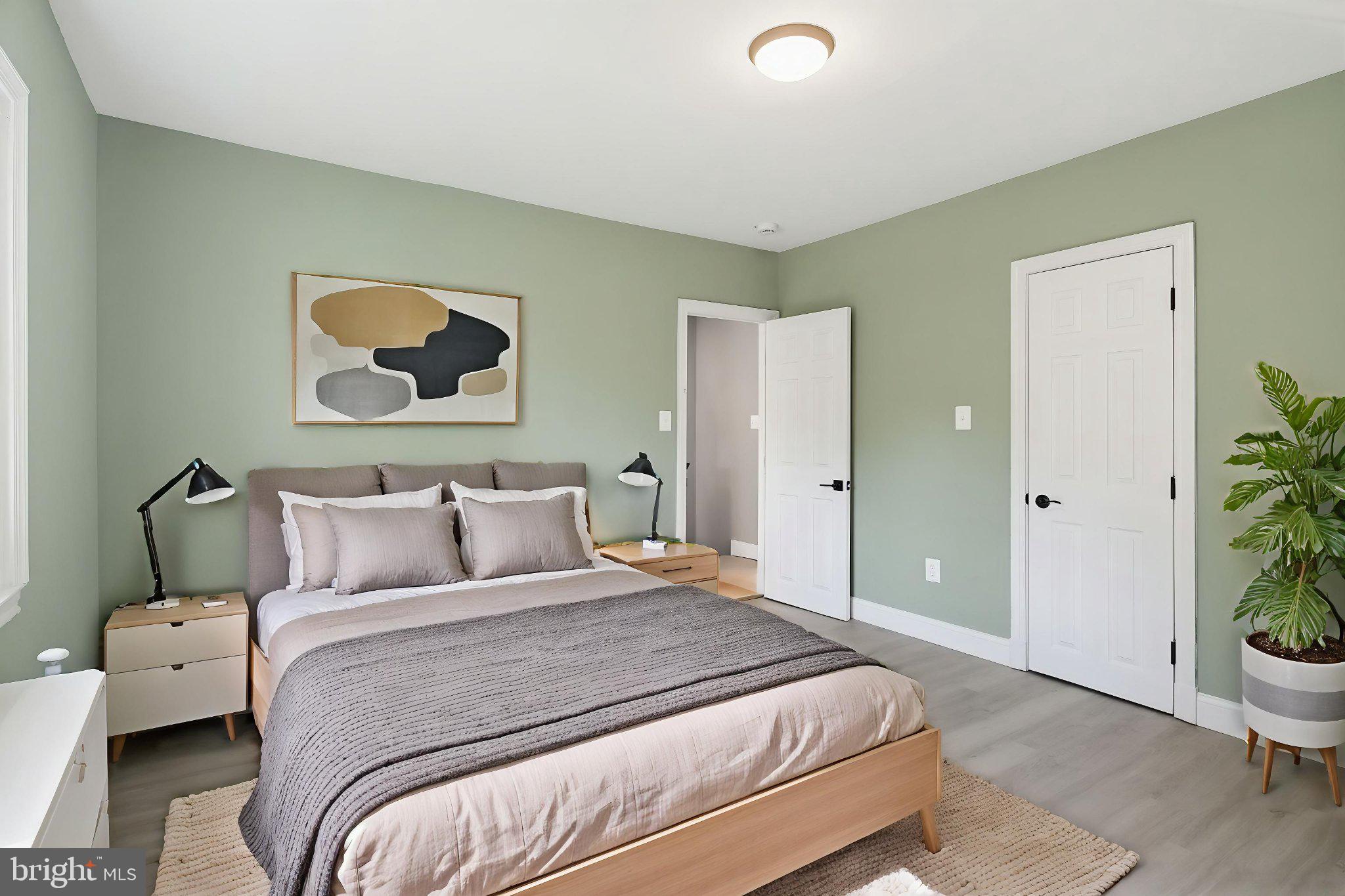 12 North Rosedale Street Baltimore, MD 21229 - Photo 20 of 25 Serene green-hued bedroom retreat.
