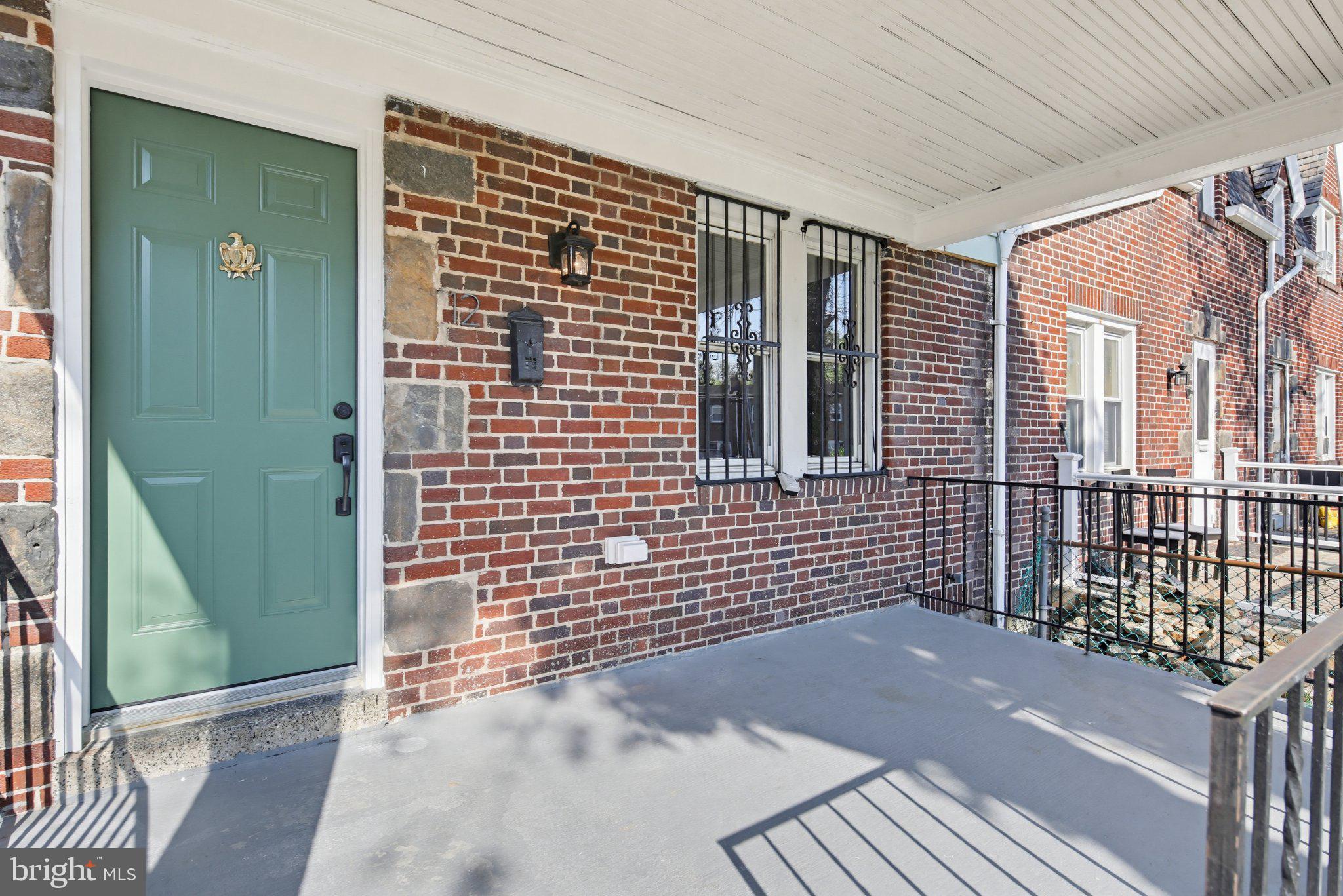 12 North Rosedale Street Baltimore, MD 21229 - Photo 2 of 25 Charming entryway with classic brick.