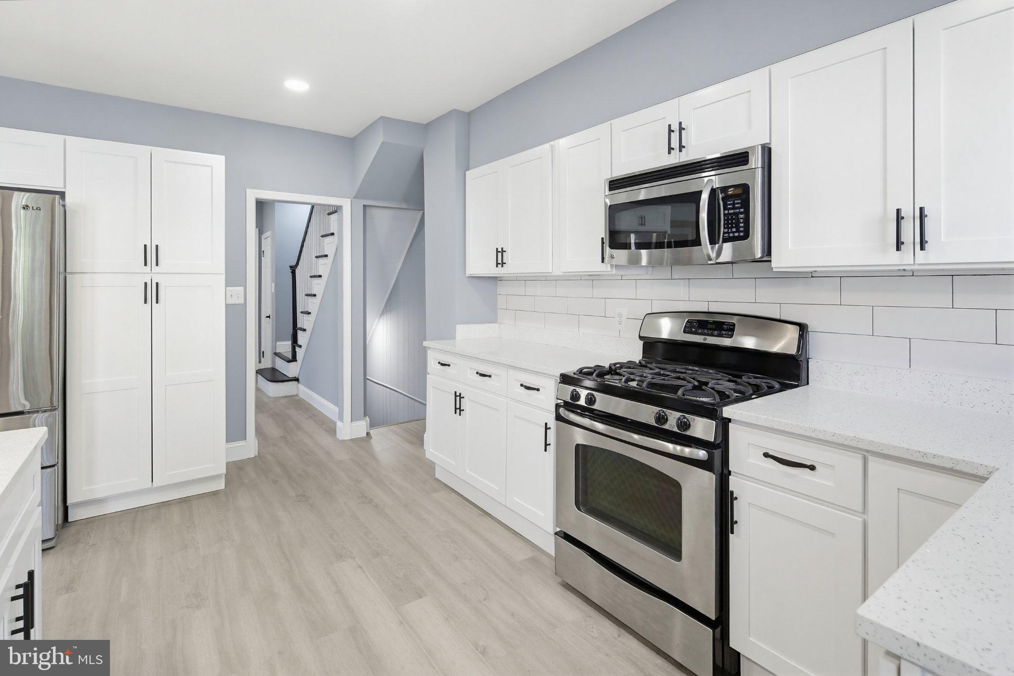 12 North Rosedale Street Baltimore, MD 21229 - Photo 4 of 25 Modern kitchen with sleek finishes.