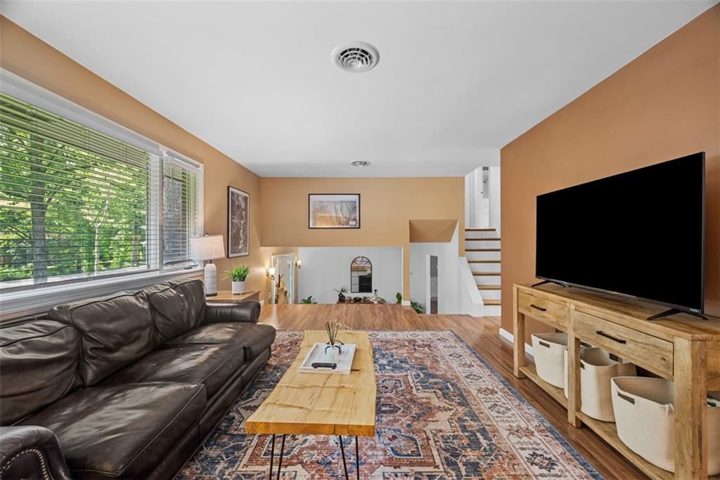 124 Heath Drive Baden, PA 15005 - Photo 13 of 42 a living room with furniture and a flat screen tv