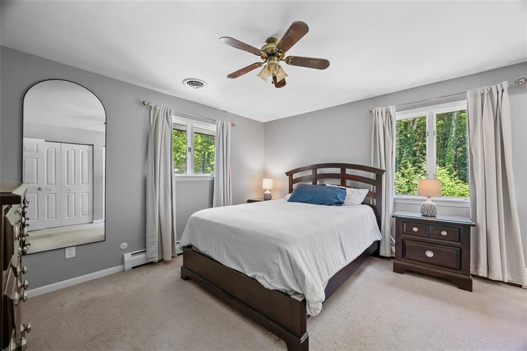 124 Heath Drive Baden, PA 15005 - Photo 22 of 42 a bedroom with a bed and window