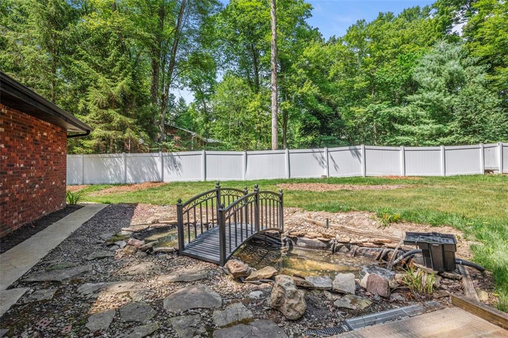124 Heath Drive Baden, PA 15005 - Photo 37 of 42 a view of a backyard with a table and chair