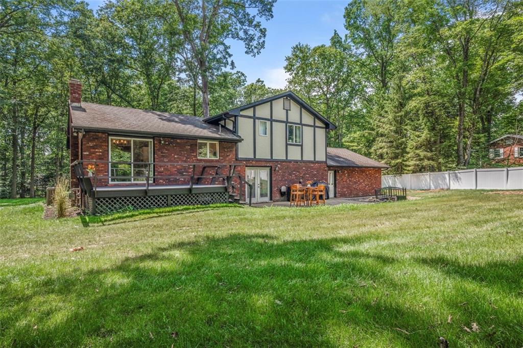 124 Heath Drive Baden, PA 15005 - Photo 40 of 42 a front view of a house with a garden