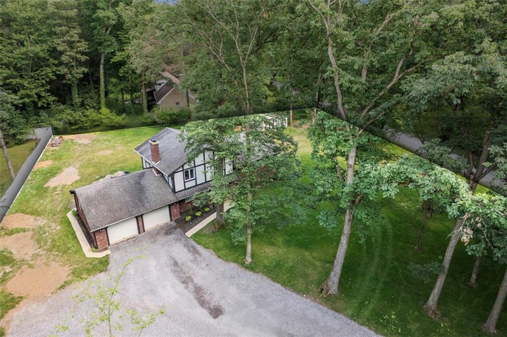 124 Heath Drive Baden, PA 15005 - Photo 4 of 42 a view of a backyard with sitting area