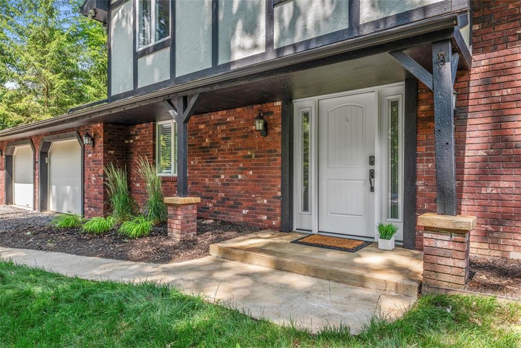 124 Heath Drive Baden, PA 15005 - Photo 6 of 42 a view of a brick house with a large windows