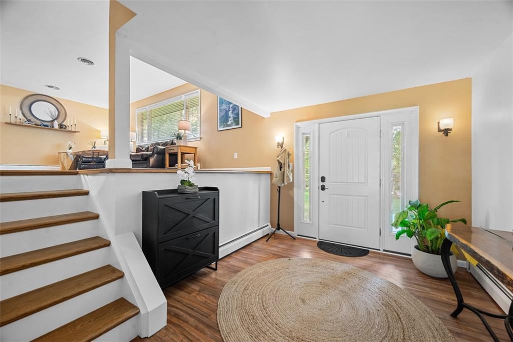 124 Heath Drive Baden, PA 15005 - Photo 8 of 42 a bedroom with furniture and a bed