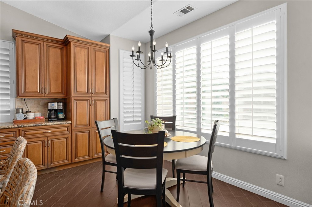 14113 Los Robles Court Rancho Cucamonga, CA 91739 - Photo 14 of 33 a dining room with furniture and window