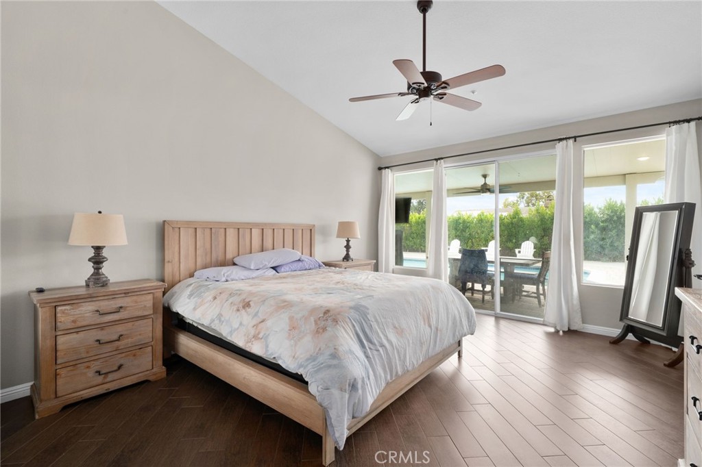 14113 Los Robles Court Rancho Cucamonga, CA 91739 - Photo 19 of 33 a bedroom with a bed and a flat tv screen on dresser