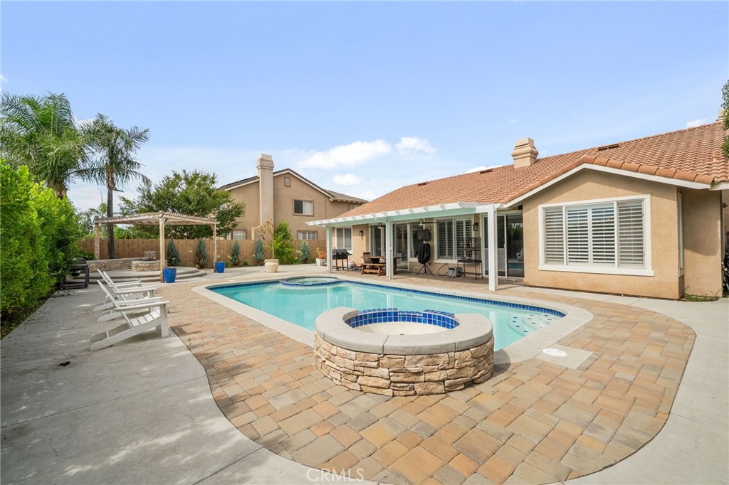 14113 Los Robles Court Rancho Cucamonga, CA 91739 - Photo 31 of 33 a view of a house with swimming pool