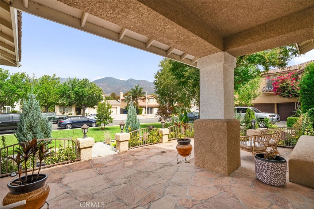 14113 Los Robles Court Rancho Cucamonga, CA 91739 - Photo 4 of 33 a view of a patio with couches and potted plants