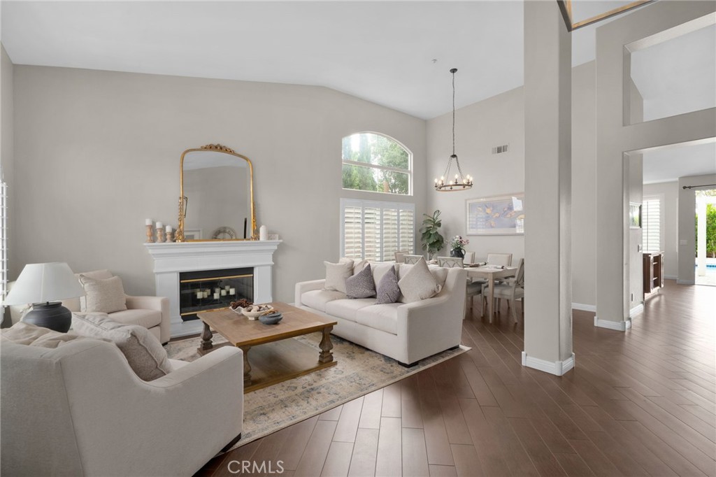 14113 Los Robles Court Rancho Cucamonga, CA 91739 - Photo 5 of 33 a living room with furniture and a fireplace