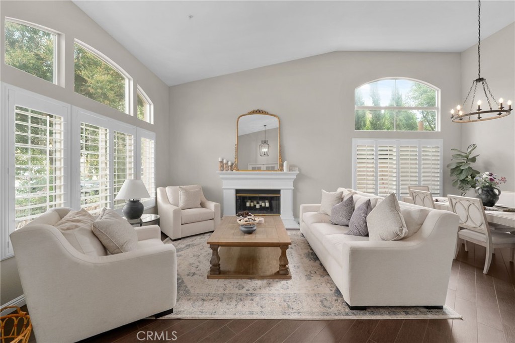 14113 Los Robles Court Rancho Cucamonga, CA 91739 - Photo 6 of 33 a living room with furniture and a fireplace
