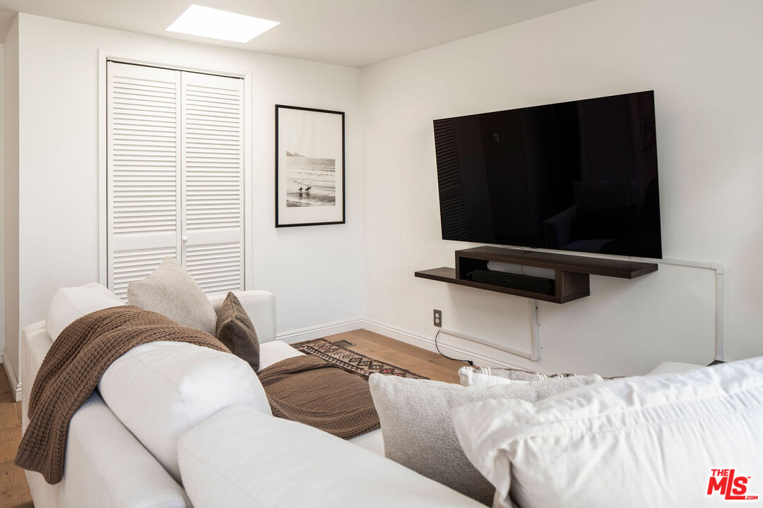 754 California Avenue Venice, CA 90291 - Photo 14 of 34 a bedroom with a bed and flat screen tv