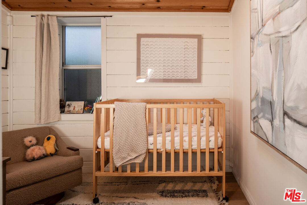 754 California Avenue Venice, CA 90291 - Photo 20 of 34 a view of a bedroom with furniture and wooden floor