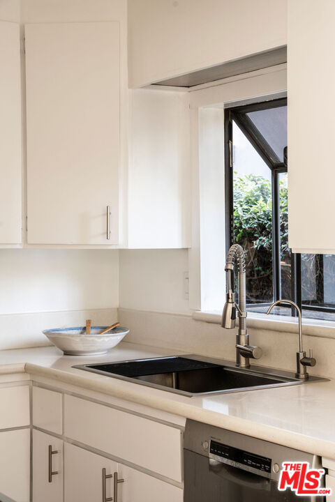 754 California Avenue Venice, CA 90291 - Photo 8 of 34 a kitchen with a sink and a window