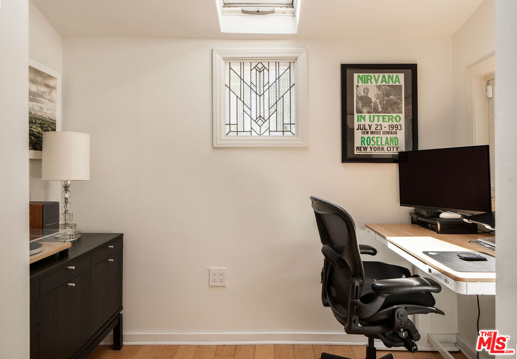 754 California Avenue Venice, CA 90291 - Photo 10 of 34 a view of a workspace with furniture and a window