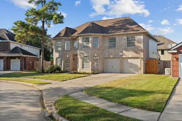 a front view of a house having yard