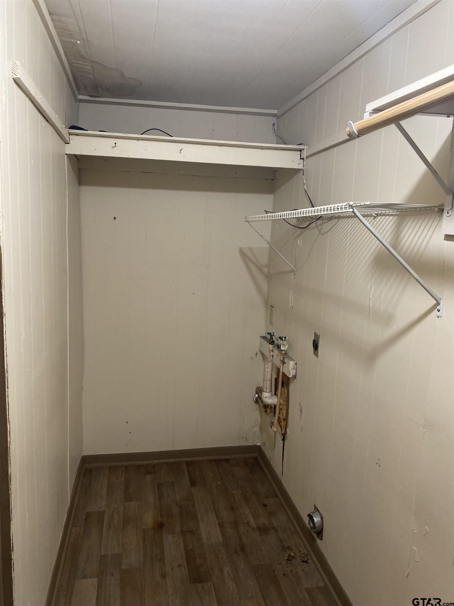 502 3rd Street Quitman, TX 75783 - Photo 21 of 22 a view of a room with racks on the wall