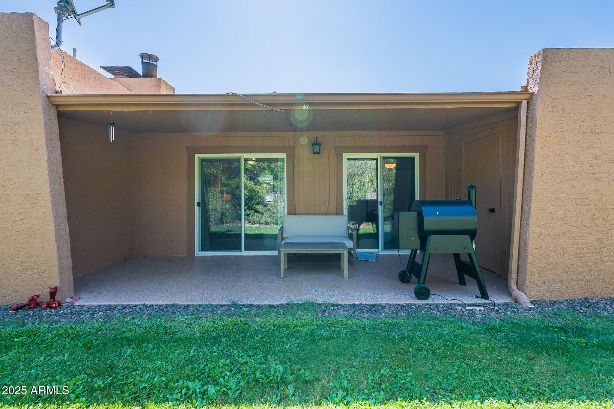 130 Castle Rock Road, Unit 100 Sedona, AZ 86351 - Photo 32 of 36 a view of an house with backyard space and a patio