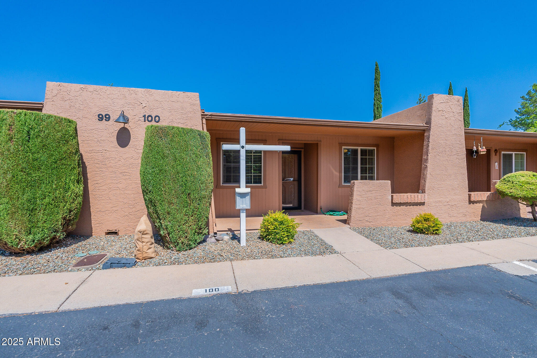 130 Castle Rock Road, Unit 100 Sedona, AZ 86351 - Photo 35 of 36 a front view of a house with garden