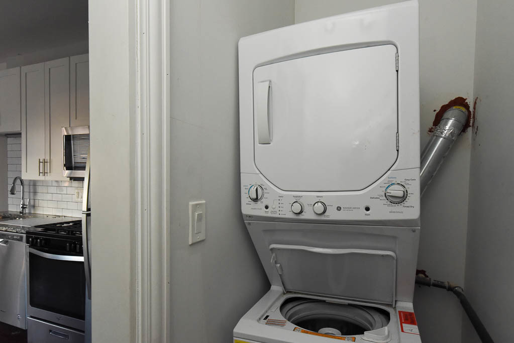 3301 North Harding Avenue, Unit 1E Chicago, IL 60618 - Photo 20 of 21 a bathroom with a toilet and a sink