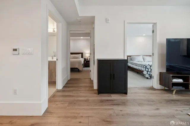 a bedroom with a bed and a table