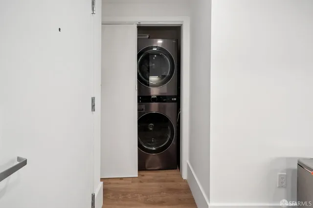 a lobby with furniture and a potted plant