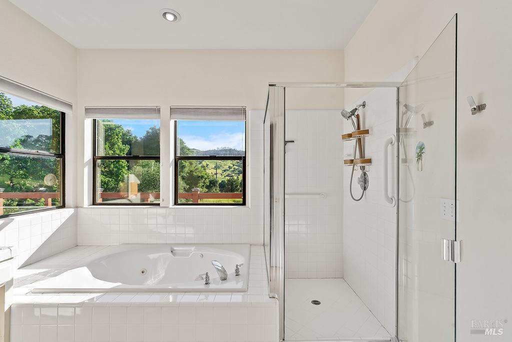 6271 Meadowstone Drive Santa Rosa, CA 95409 - Photo 11 of 24 a bathroom with a bathtub and a shower
