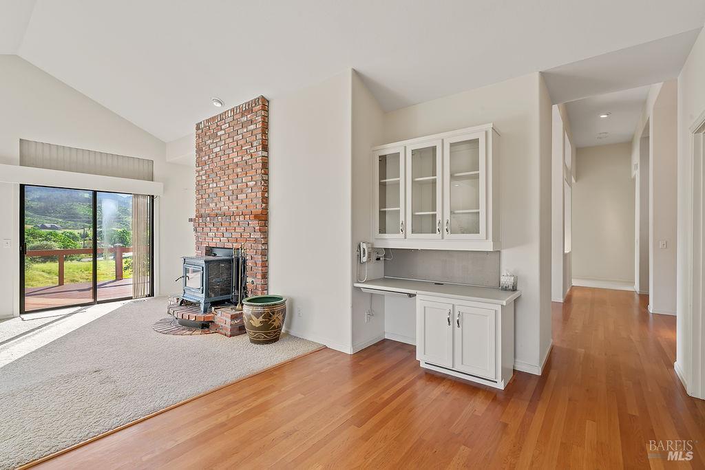 6271 Meadowstone Drive Santa Rosa, CA 95409 - Photo 15 of 24 a living room with furniture a large window and wooden floor