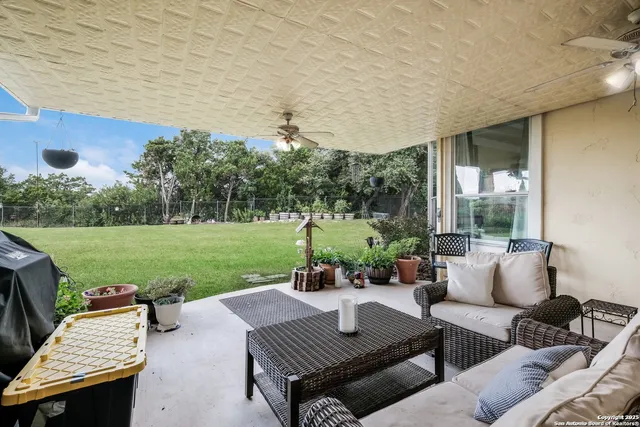 a outdoor living space with furniture and garden view