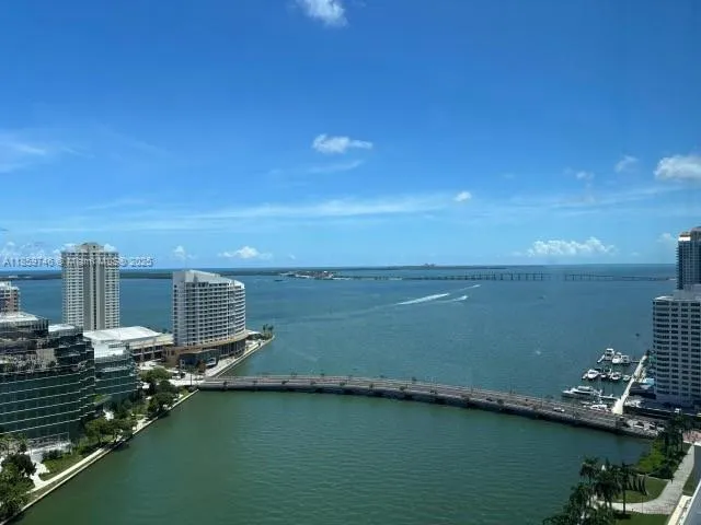 a view of a lake with a city