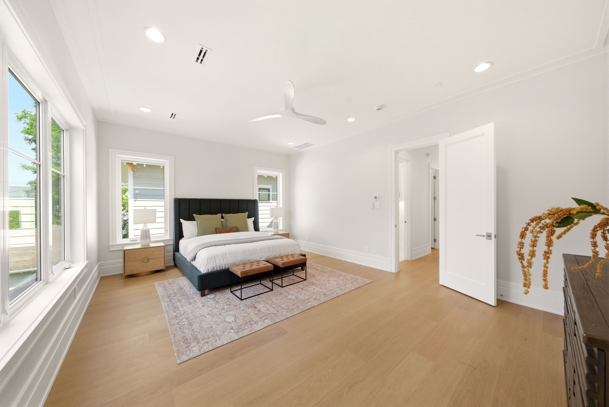 1023 Euclid Street Houston, TX 77009 - Photo 23 of 50 Spacious primary suite, a true retreat filled with natural light, and a calming neutral palette.