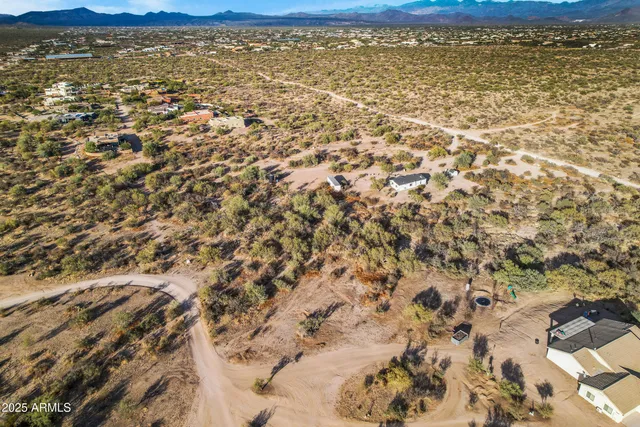 a view of an empty room with a lake view