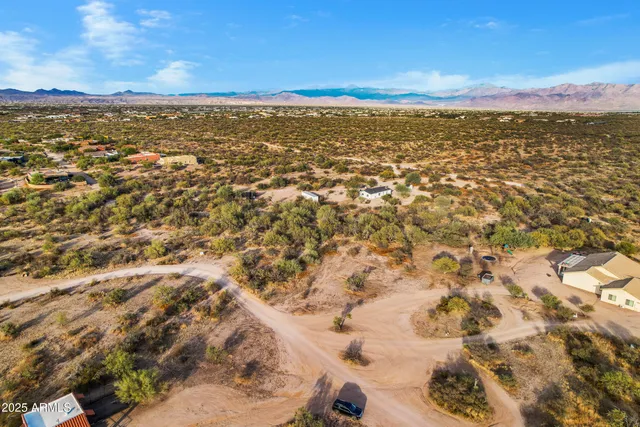 a view of beach and mountain