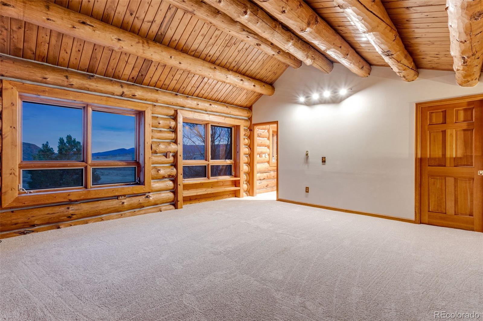 7050 Milner Mountain Ranch Road Fort Collins, CO 80526 - Photo 32 of 50 a view of an empty room
