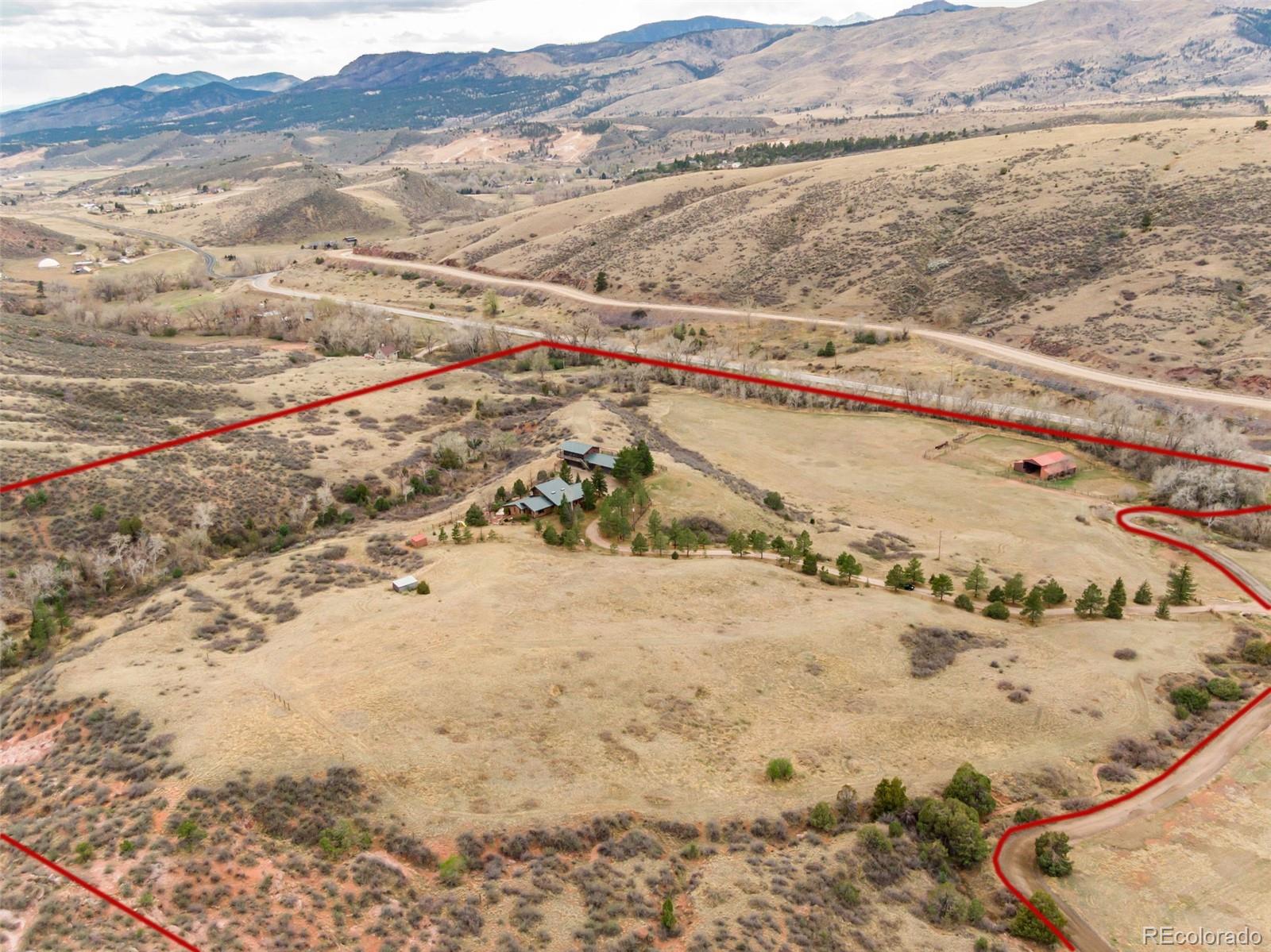 7050 Milner Mountain Ranch Road Fort Collins, CO 80526 - Photo 5 of 50 a view of ocean and a mountain