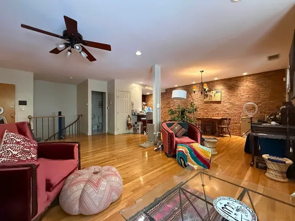 a view of a living room and dining room