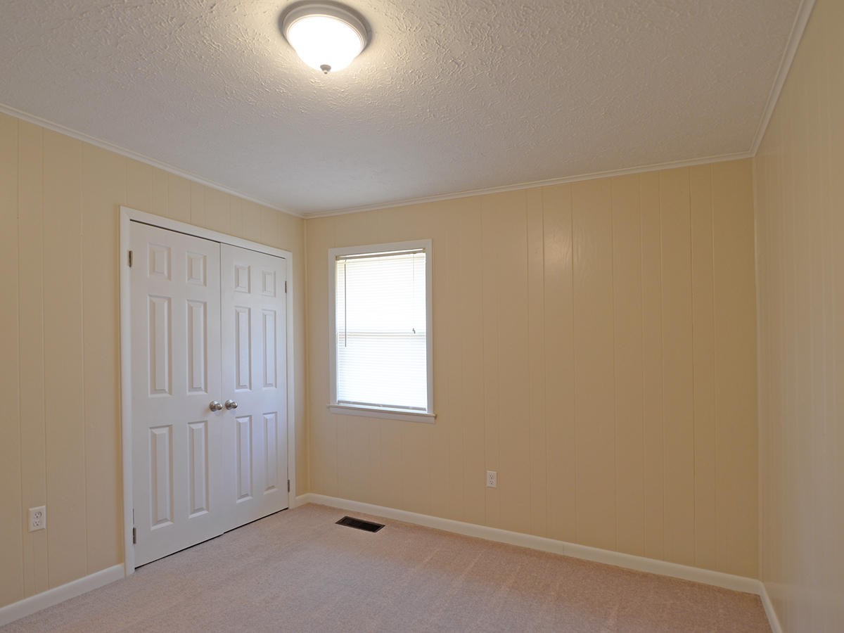 234 Evans Road Kingston, TN 37763 - Photo 11 of 12 an empty room with windows