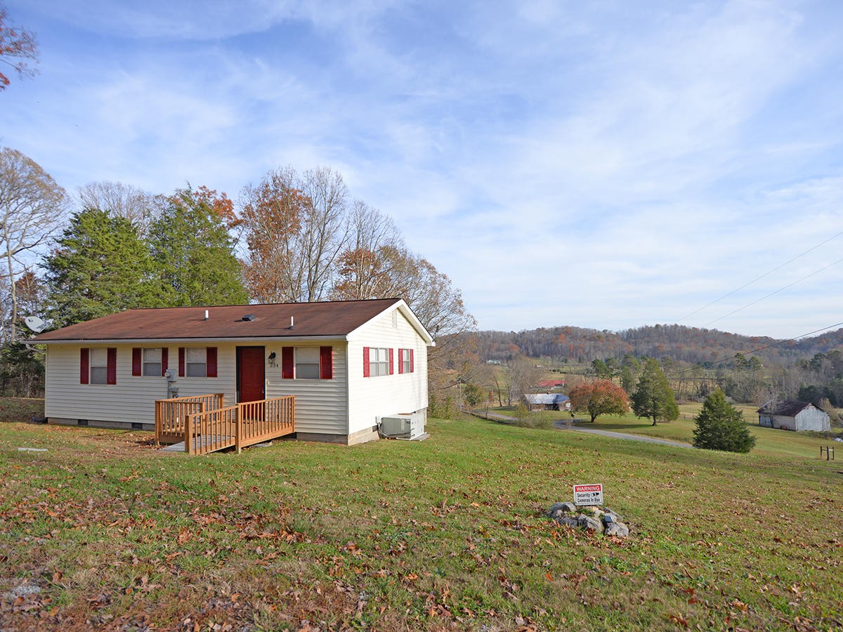 234 Evans Road Kingston, TN 37763 - Photo 3 of 12 front view of a house with a big yard