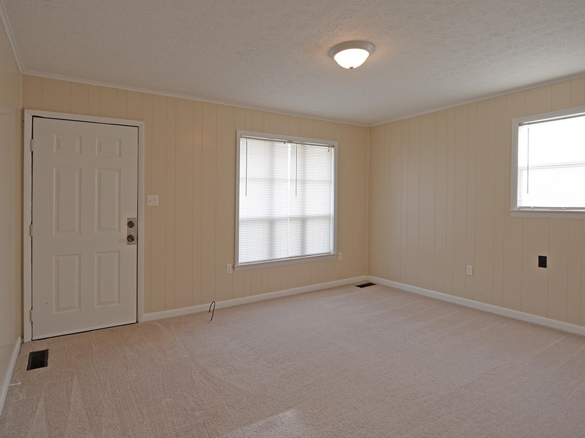 234 Evans Road Kingston, TN 37763 - Photo 4 of 12 a view of an empty room with a window