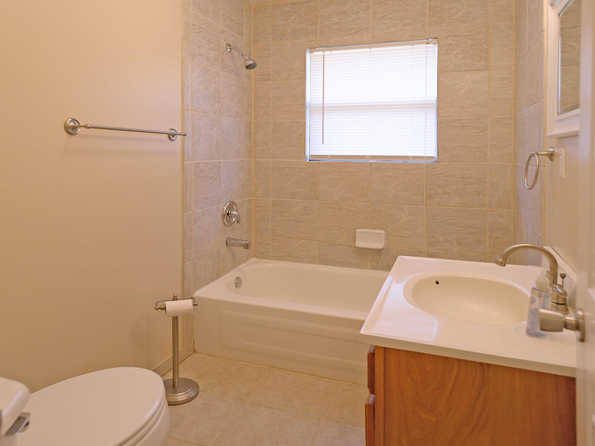 234 Evans Road Kingston, TN 37763 - Photo 8 of 12 a bathroom with a sink a toilet and shower