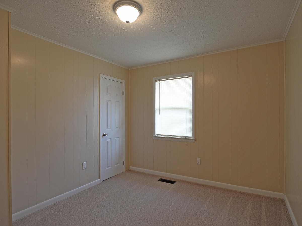 234 Evans Road Kingston, TN 37763 - Photo 9 of 12 an empty room with a window