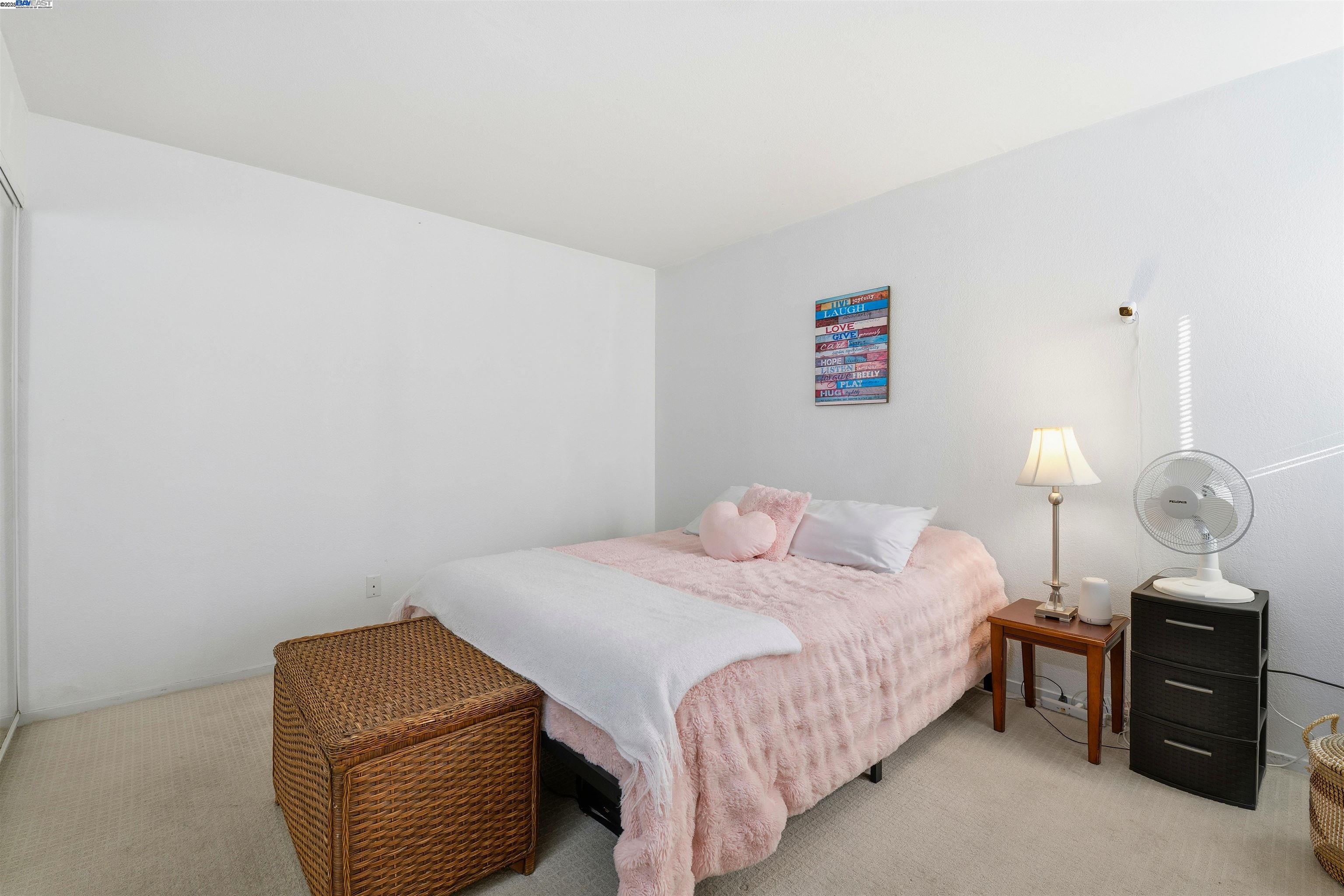 2131 Lakeview Circle Pittsburg, CA 94565 - Photo 11 of 24 a bedroom with a bed and dresser