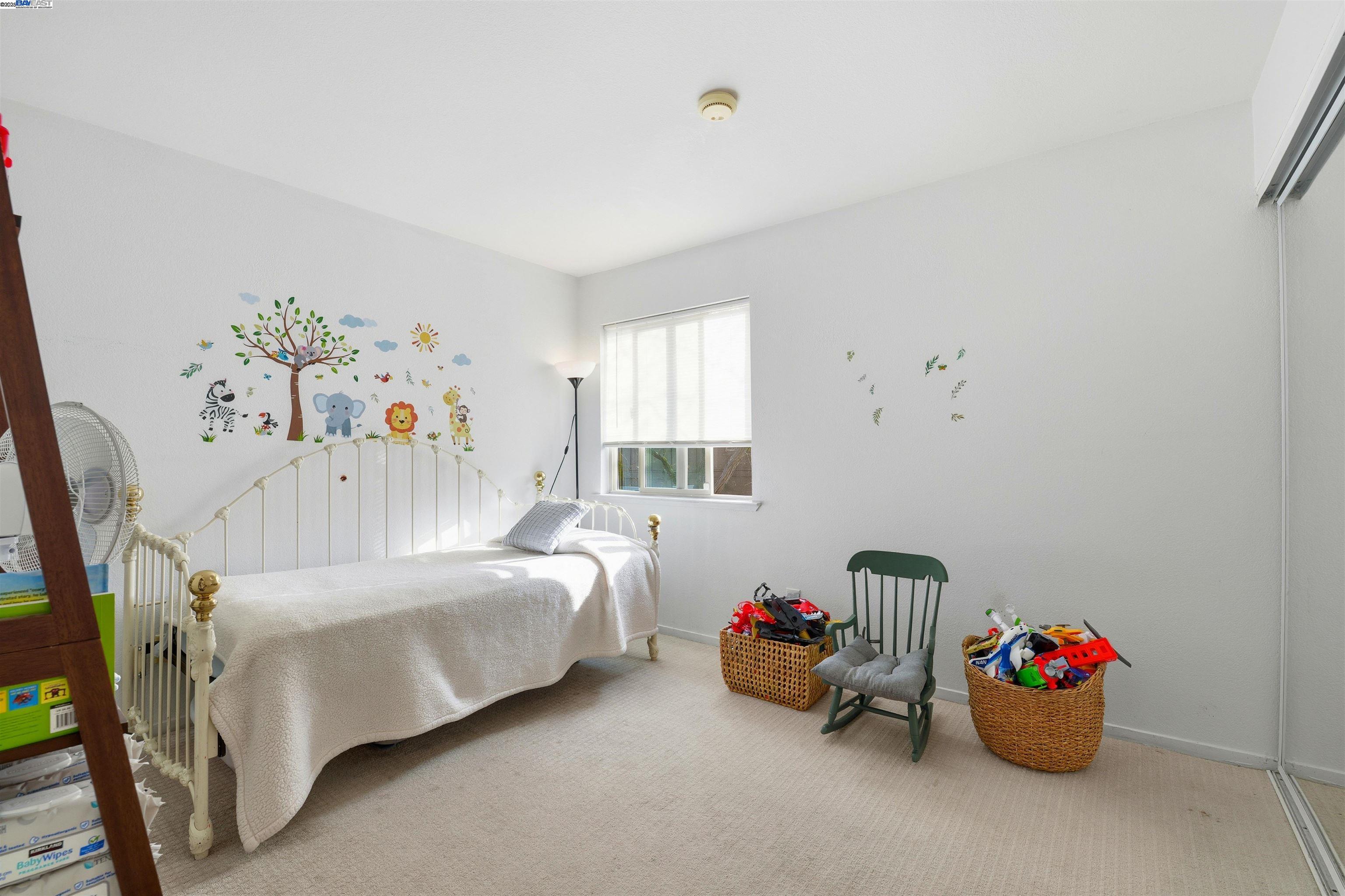 2131 Lakeview Circle Pittsburg, CA 94565 - Photo 13 of 24 a bedroom with furniture and a bed