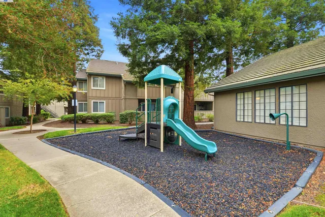 a view of a house with a park